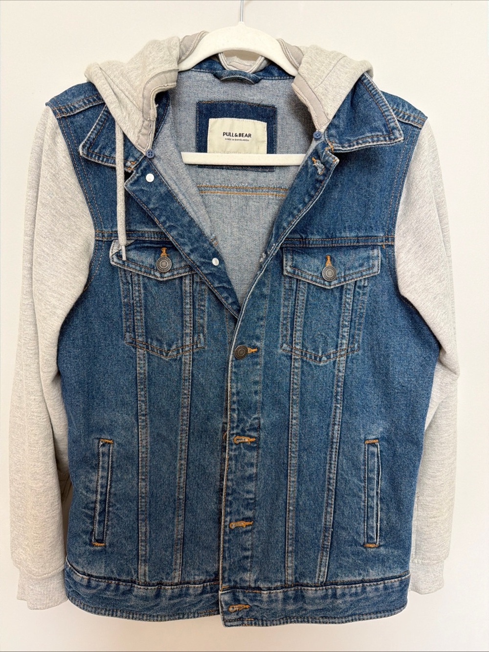 Pull&Bear Blue Denim Jacket with Gray Hoodie Sleeves, size small.